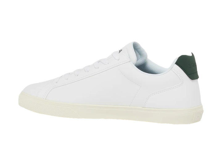 Tenis Lacoste Lerond Pro de cuero blanco con detalle verde en el talón y logotipo del cocodrilo lateral.