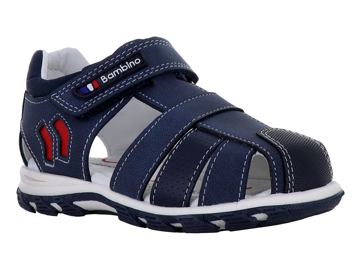 Sandalia cerrada para niño en color azul marino con detalles rojos y suela blanca.