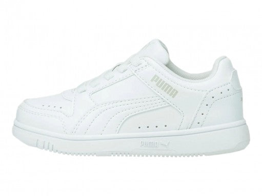 Tenis PUMA Rebound Joy LO AC PS en color blanco total para niños pequeños.
