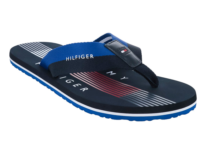 Sandalias Tommy Hilfiger color azul marino con detalles en blanco y azul brillante, diseño de rayas.