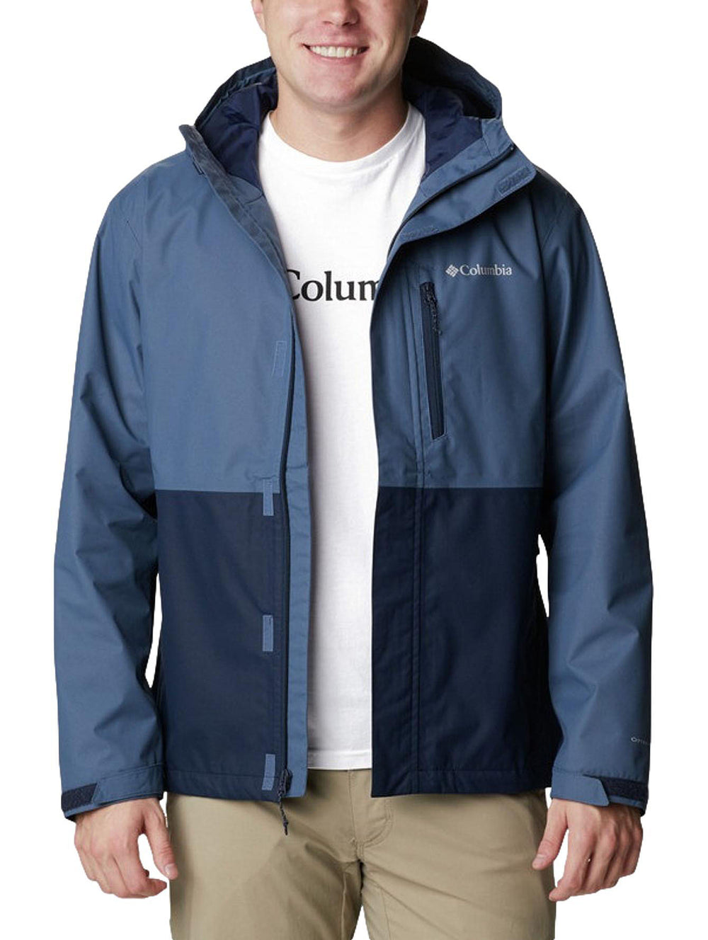 Chaqueta Columbia de dos tonos de azul con capucha, diseñada para actividades al aire libre.