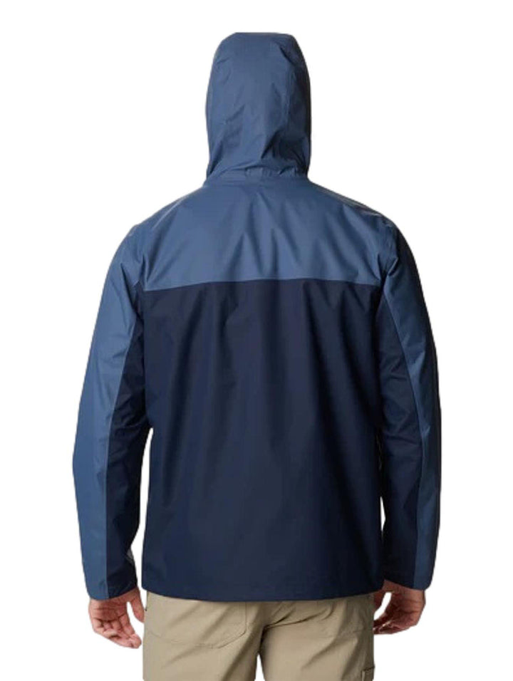 Chaqueta Columbia de dos tonos de azul con capucha, diseñada para actividades al aire libre.
