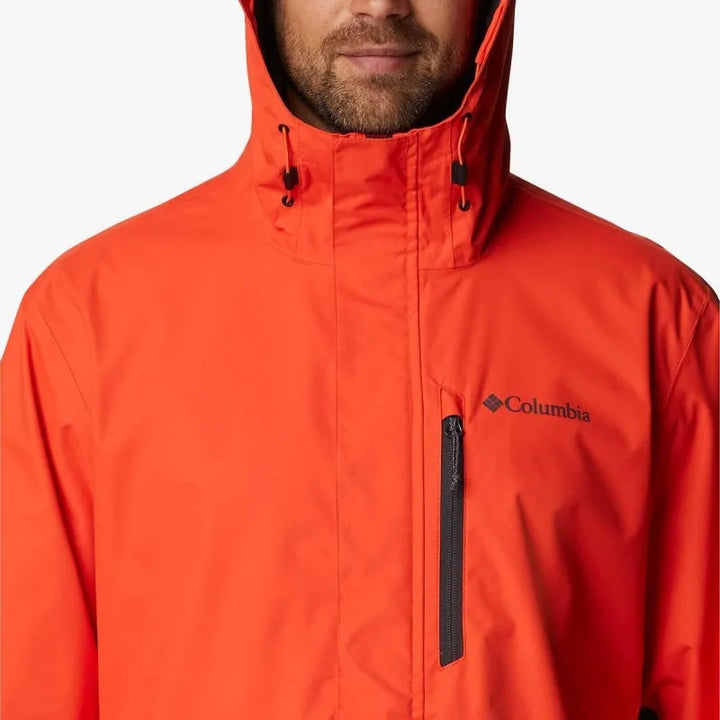 Chaqueta Columbia Hikebound bicolor en naranja y gris oscuro con capucha.