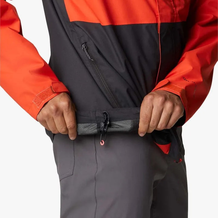 Chaqueta Columbia Hikebound bicolor en naranja y gris oscuro con capucha.