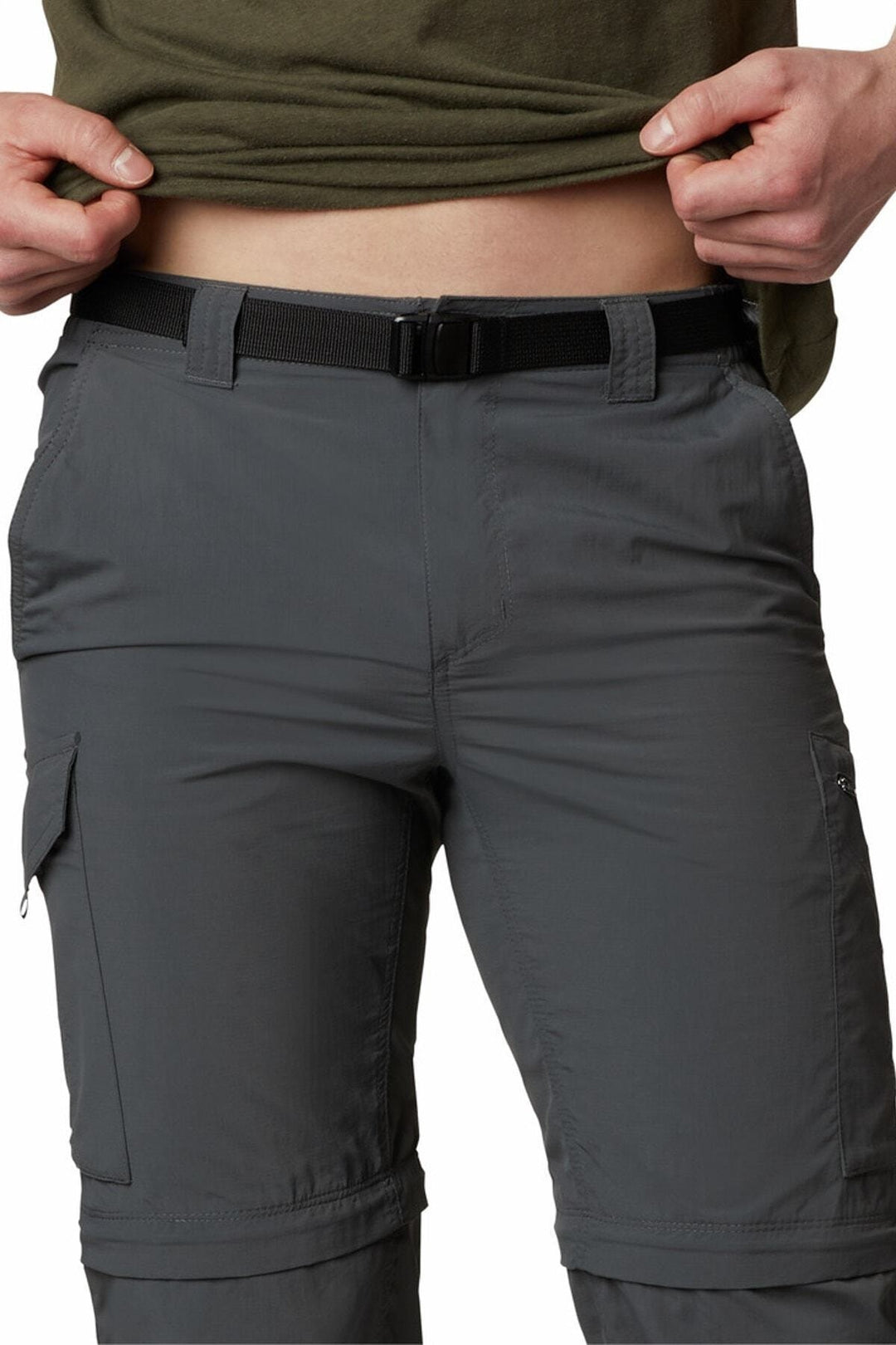 Pantalón convertible Columbia color gris con cinturón negro y bolsillos laterales para actividades al aire libre.