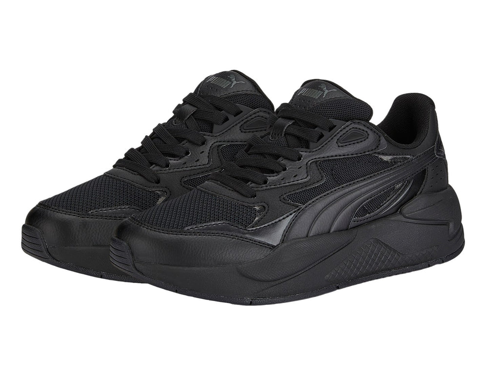 Tenis deportivos PUMA X-RAY SPEED JR en color negro con detalles de malla y materiales sintéticos.