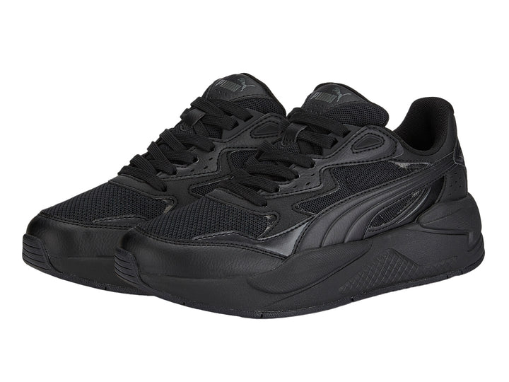 Tenis deportivos PUMA X-RAY SPEED JR en color negro con detalles de malla y materiales sintéticos.