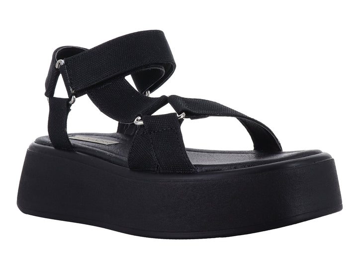 Sandalias de plataforma color negro con correas ajustables para mujer.