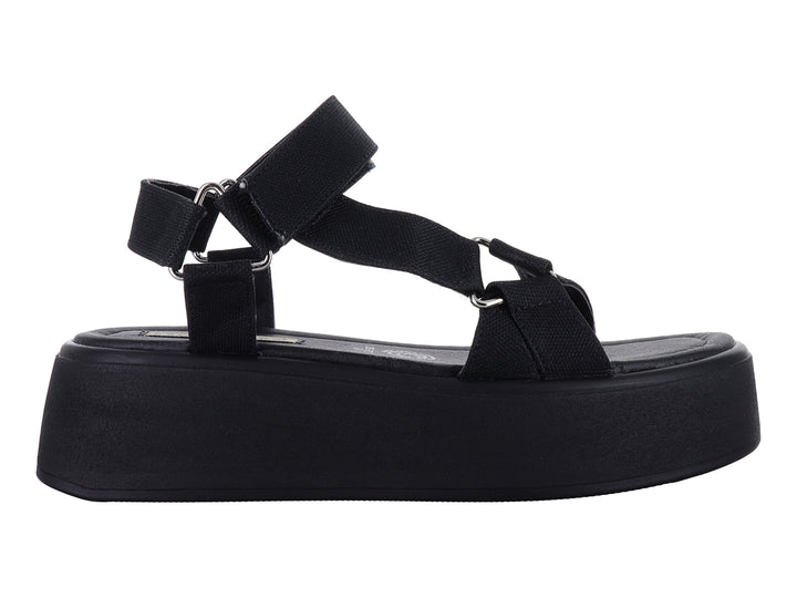Sandalias de plataforma color negro con correas ajustables para mujer.