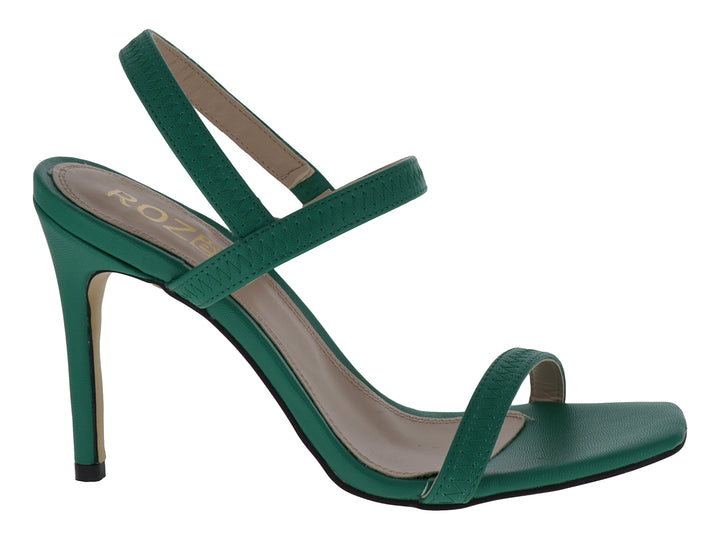 Sandalia de tacón alto color verde esmeralda con tiras cruzadas y plantilla beige.