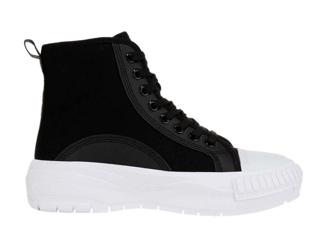 Tenis Lotto de bota alta en color negro con suela blanca gruesa y punta reforzada.