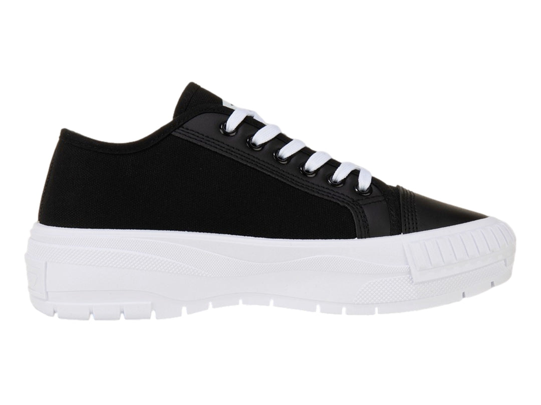 Tenis Lotto Ruvin W Low color negro con suela blanca ancha y cordones blancos.