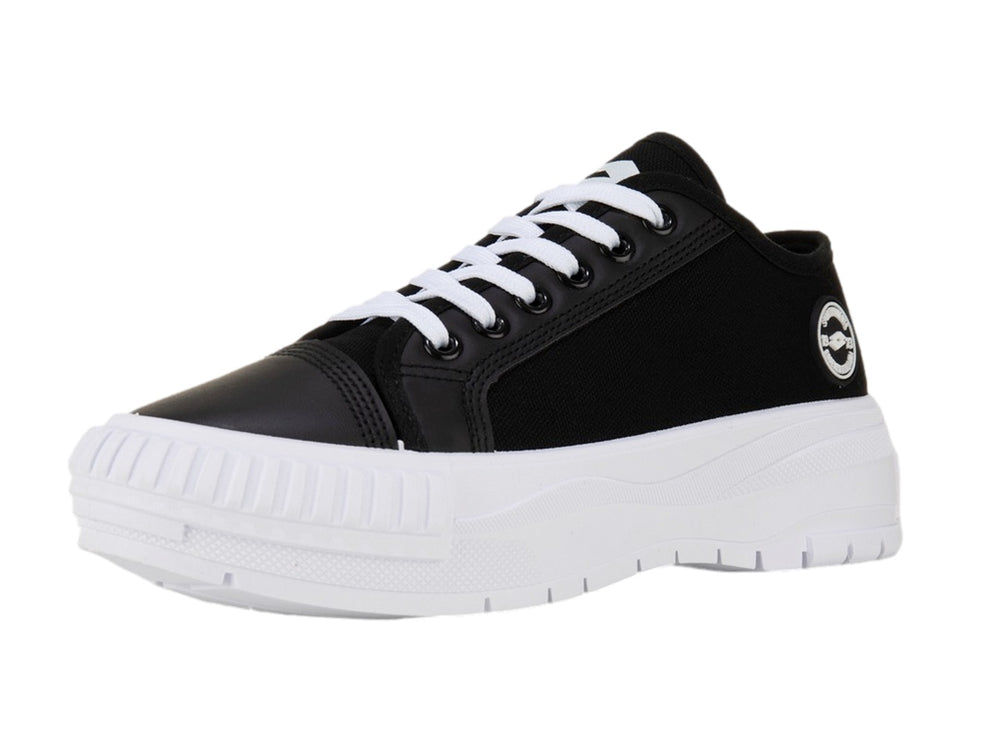Tenis Lotto Ruvin W Low color negro con suela blanca ancha y cordones blancos.
