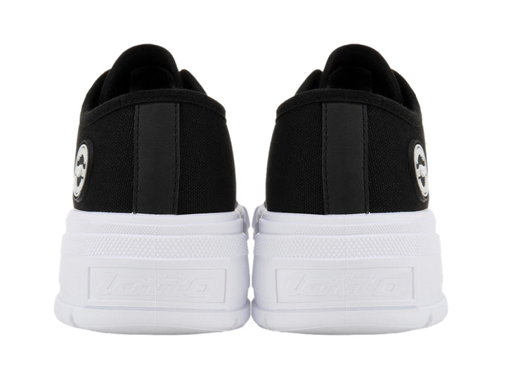 Tenis Lotto Ruvin W Low color negro con suela blanca ancha y cordones blancos.