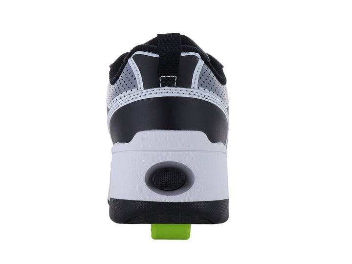 Tenis Heelys en colores negro, gris y amarillo con suela de plataforma blanca y negra.