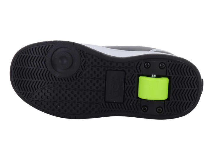 Tenis Heelys en colores negro, gris y amarillo con suela de plataforma blanca y negra.