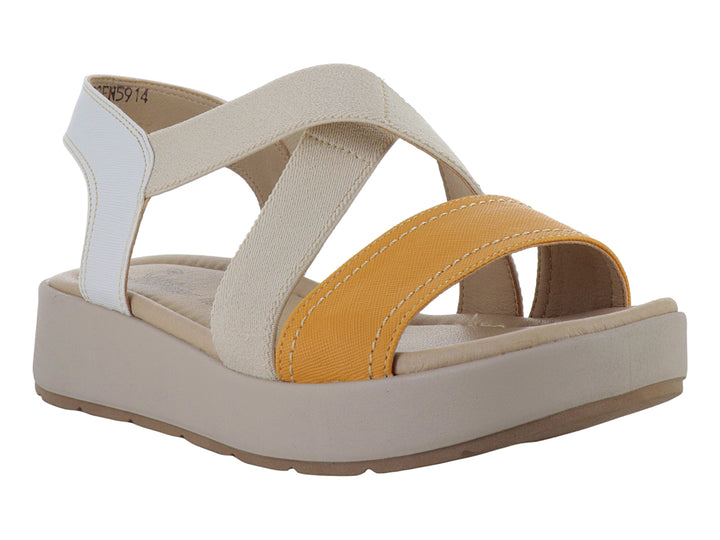 Sandalia de plataforma Suave Caminar en colores marfil y mostaza con tiras textiles.