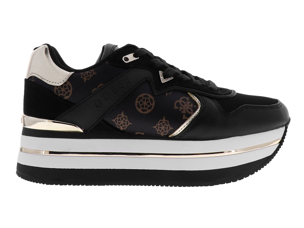 Tenis negros de plataforma marca GUESS con detalles en blanco y oro rosa y estampado de monograma lateral.