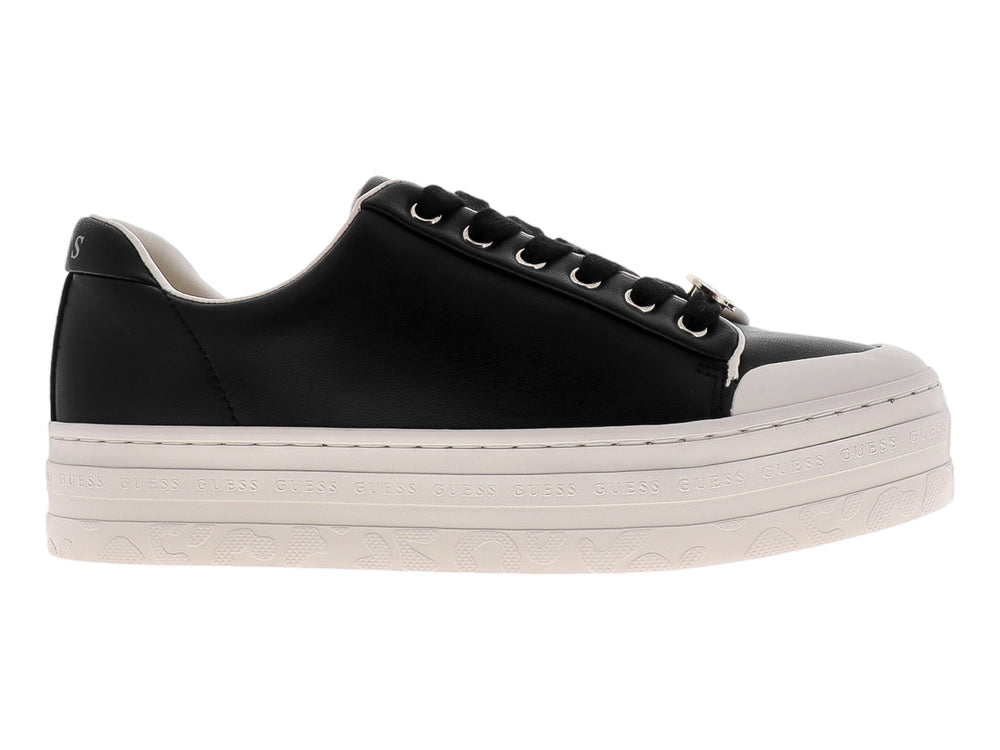 Tenis casuales Guess color negro con suela blanca de plataforma para mujer.