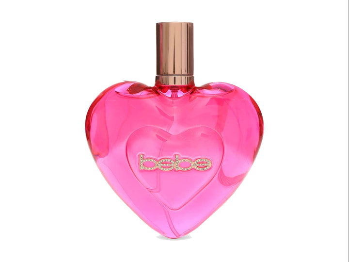 Perfume Bebe Luxe Wild en frasco rosa con forma de corazón y su caja decorada con estampado animal.