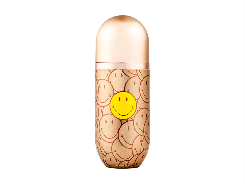 Perfume Carolina Herrera 212 VIP Rose Smiley en frasco y caja dorada con estampado de caritas sonrientes amarillas.
