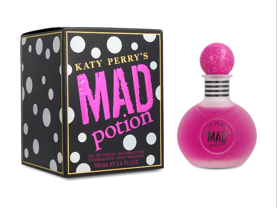 Perfume Katy Perry Mad Potion con frasco esférico rosa y caja negra con lunares blancos.