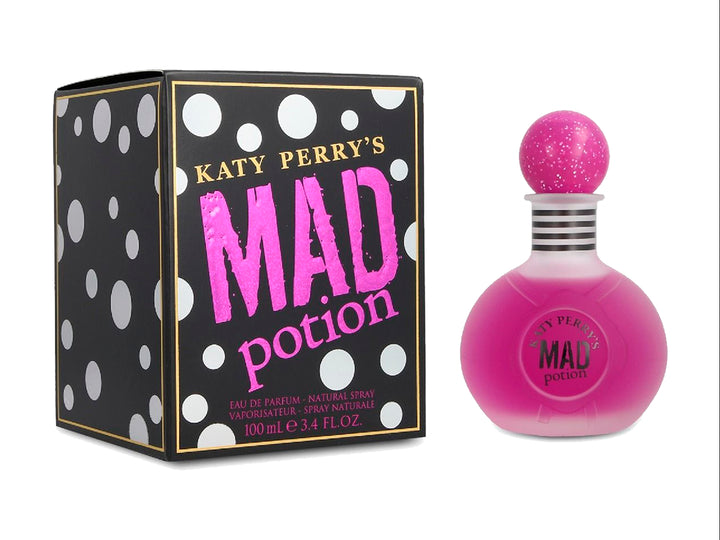 Perfume Katy Perry Mad Potion con frasco esférico rosa y caja negra con lunares blancos.