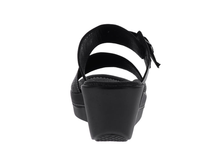 Sandalias negras de plataforma para mujer con correa ajustable y detalles perforados.