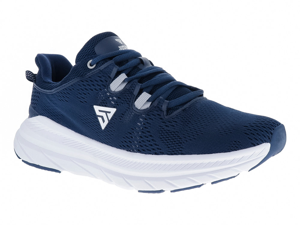 Tenis deportivos Justart color azul marino con suela blanca y malla transpirable.