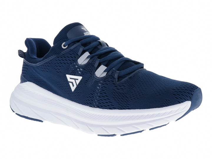 Tenis deportivos Justart color azul marino con suela blanca y malla transpirable.