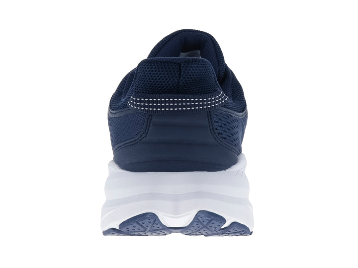 Tenis deportivos Justart color azul marino con suela blanca y malla transpirable.