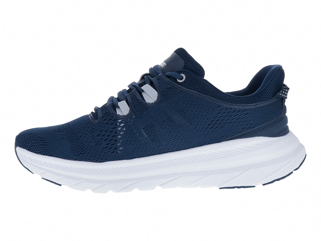 Tenis deportivos Justart color azul marino con suela blanca y malla transpirable.