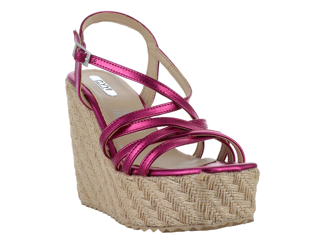 Sandalia de plataforma color bugambilia metálico con suela de tejido beige y correas cruzadas.