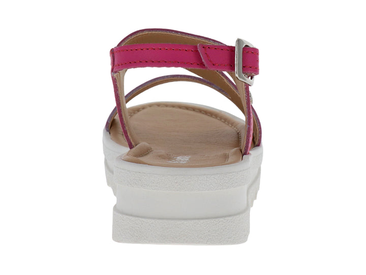 Sandalia fucsia para Niña con suela blanca de plataforma y hebilla plateada.