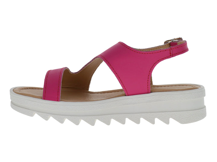 Sandalia fucsia para Niña con suela blanca de plataforma y hebilla plateada.