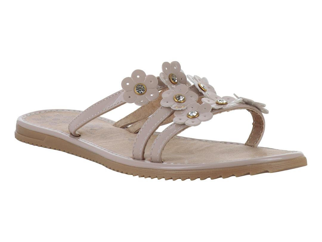 Sandalias planas color maquillaje con detalles de flores decorativas en la parte superior.