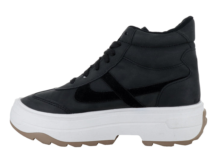 Tenis PANAM color negro con suela de plataforma blanca y base café.