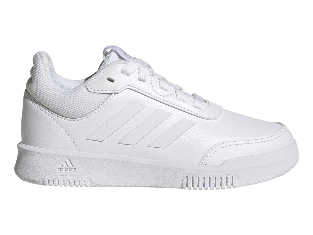 Tenis deportivos Adidas color blanco para niños, vista lateral.