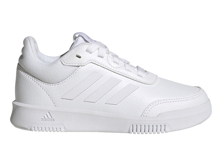 Tenis deportivos Adidas color blanco para niños, vista lateral.