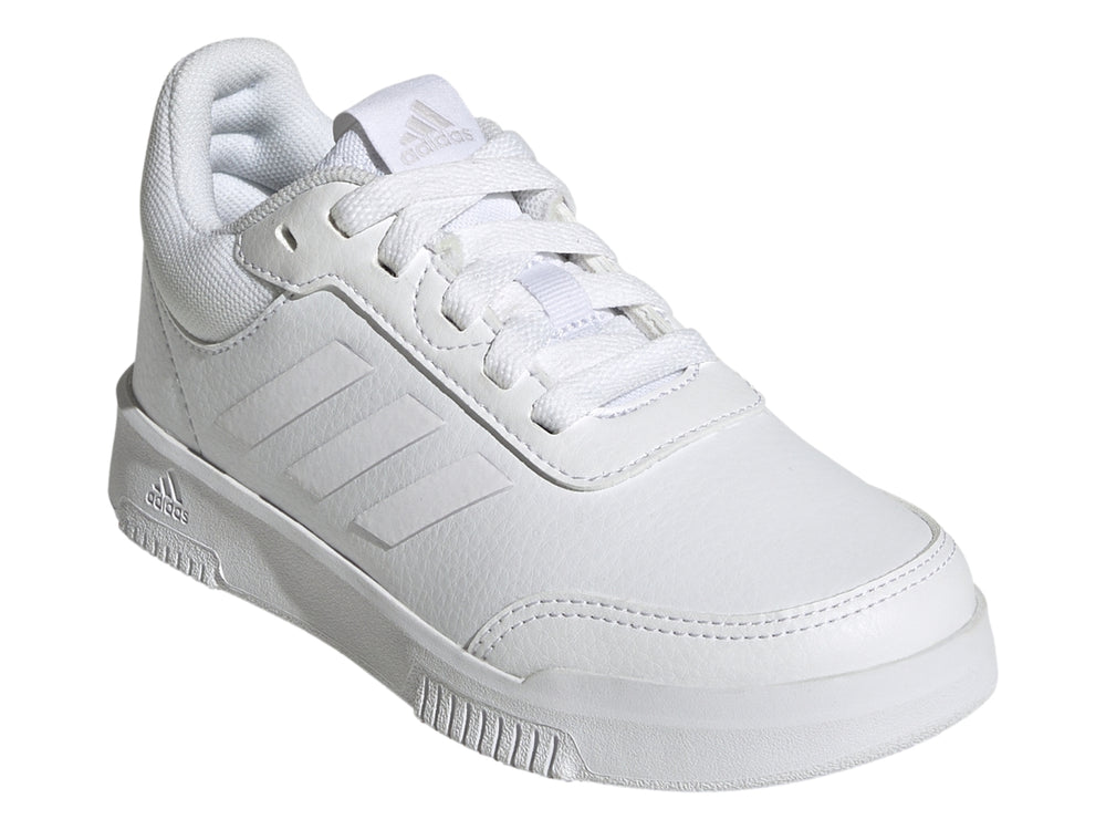 Tenis deportivos Adidas color blanco para niños, vista lateral.