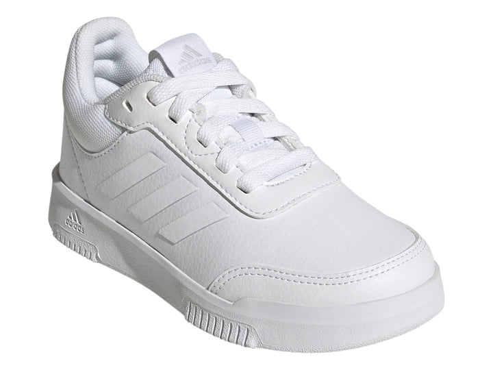 Tenis deportivos Adidas color blanco para niños, vista lateral.
