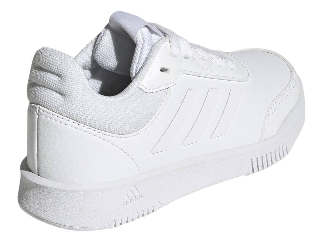 Tenis deportivos Adidas color blanco para niños, vista lateral.