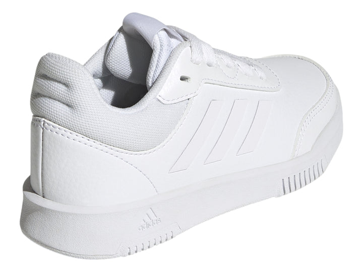 Tenis deportivos Adidas color blanco para niños, vista lateral.