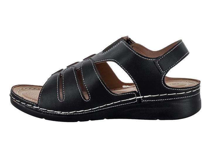 Sandalia negra Comfort Fit con costuras blancas y correa ajustable.