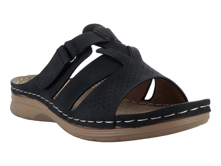 Sandalia Comfort Fit color negro con correas ajustables y suela beige para mujer.