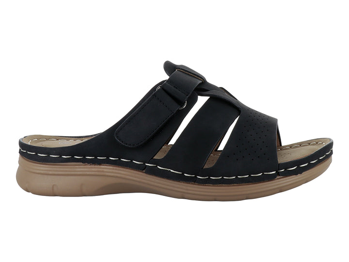 Sandalia Comfort Fit color negro con correas ajustables y suela beige para mujer.