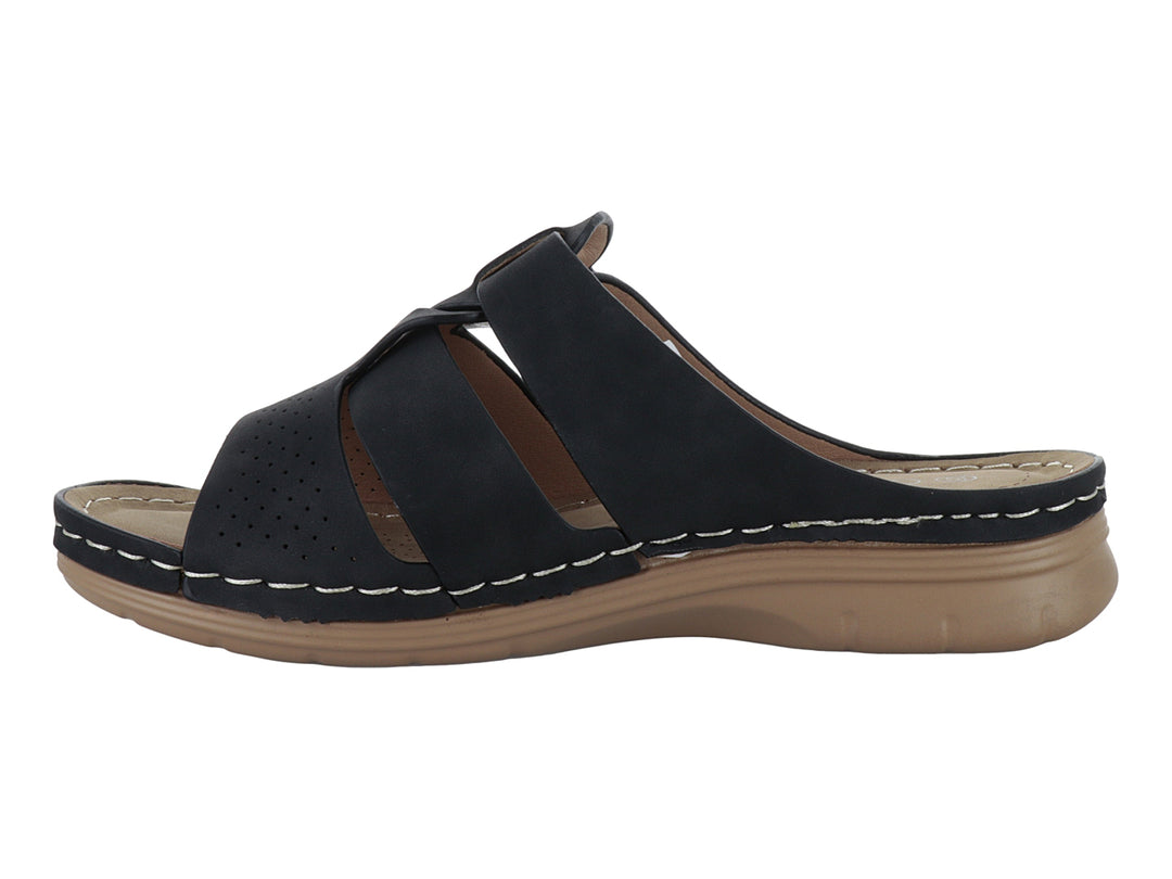 Sandalia Comfort Fit color negro con correas ajustables y suela beige para mujer.