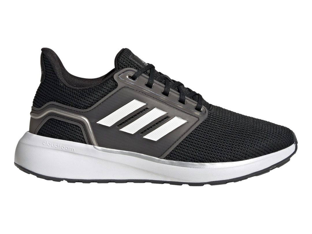 Tenis deportivos Adidas color negro con tres franjas blancas y suela blanca.