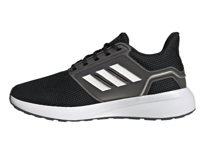 Tenis deportivos Adidas color negro con tres franjas blancas y suela blanca.