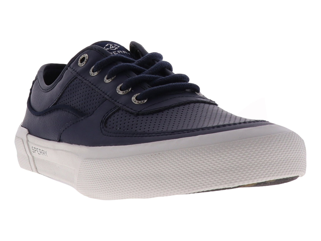 Zapatilla Sperry de color azul marino con suela blanca y cordones, estilo casual y deportivo.